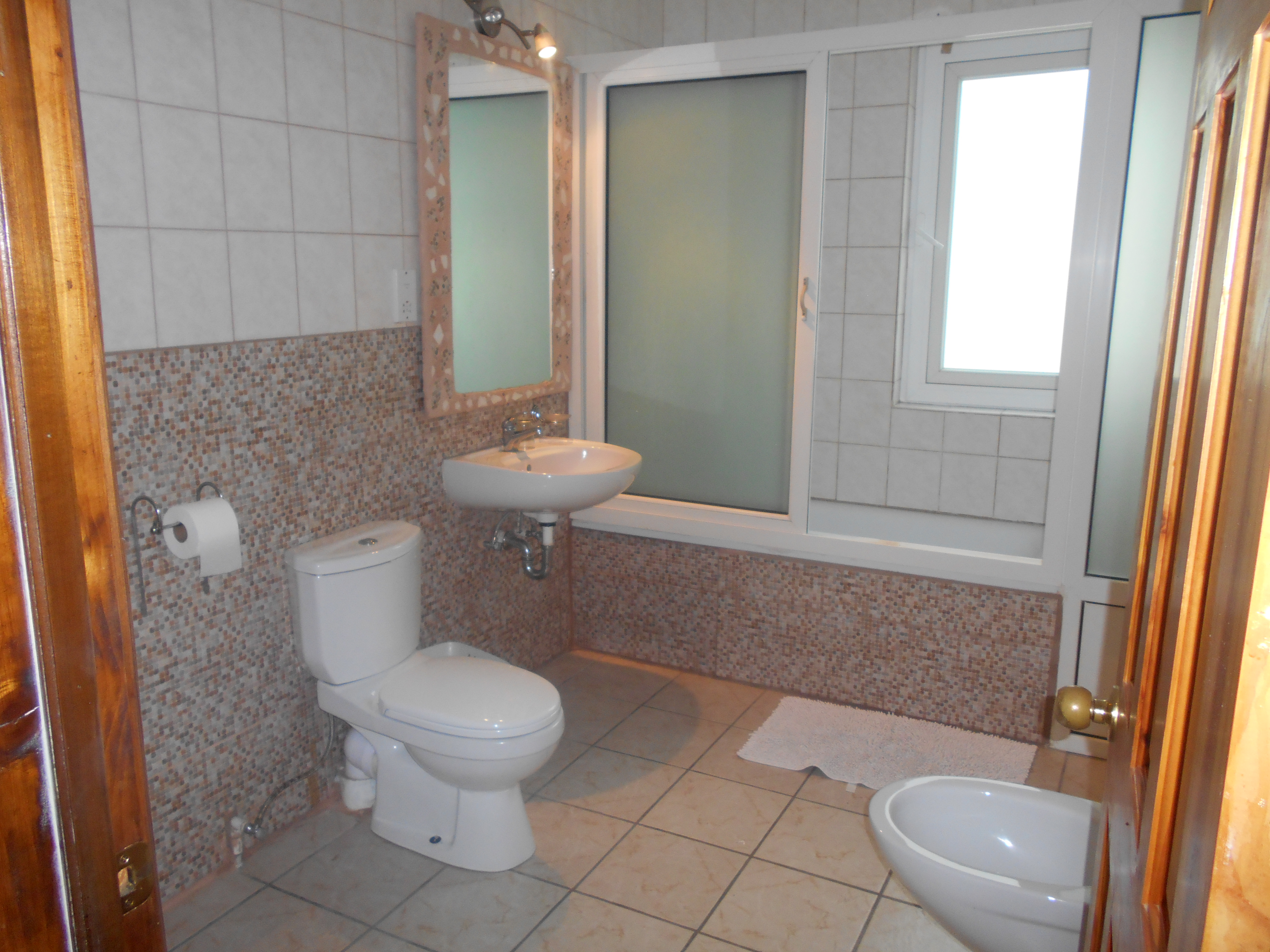 4 bedrooms, 3 baths ground floor apt
