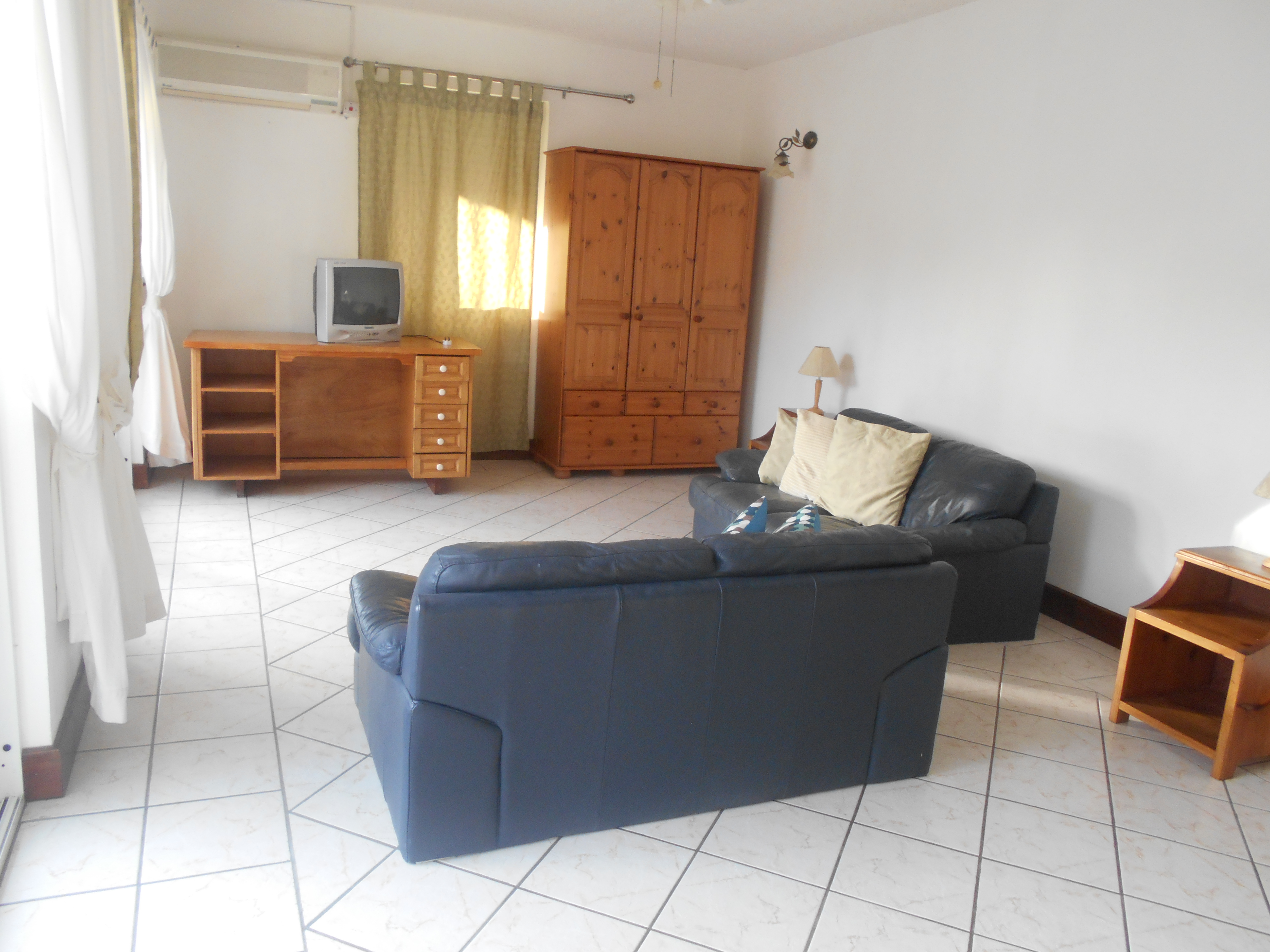 4 bedrooms, 3 baths ground floor apt